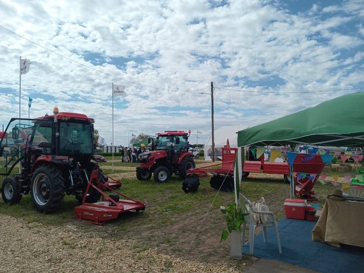 Tavol tractors on display at an outdoor machinery exhibition in Argentina